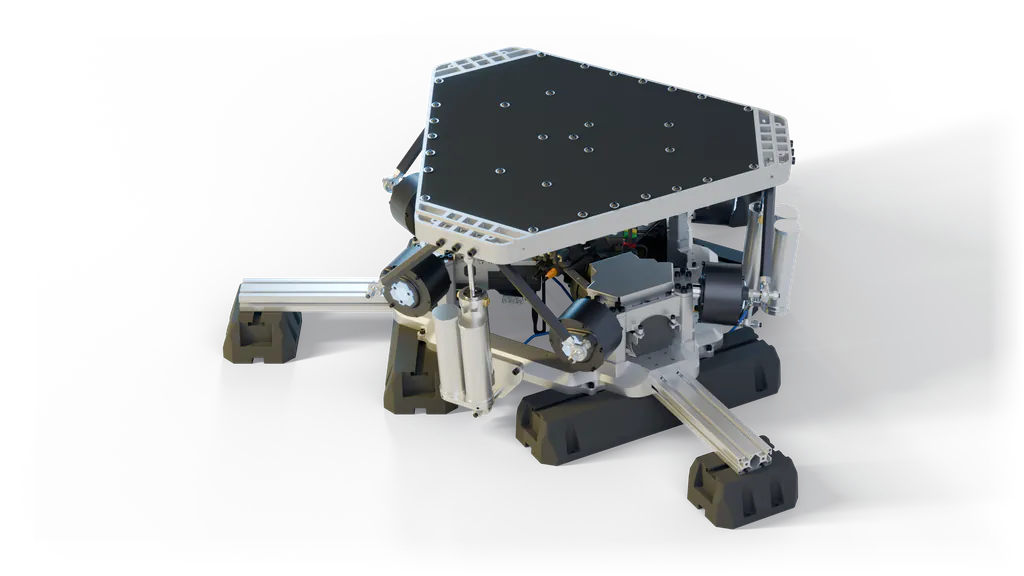 The PDK on its extension feet with the table fitted: three legs at 120 degrees, one from each motor block